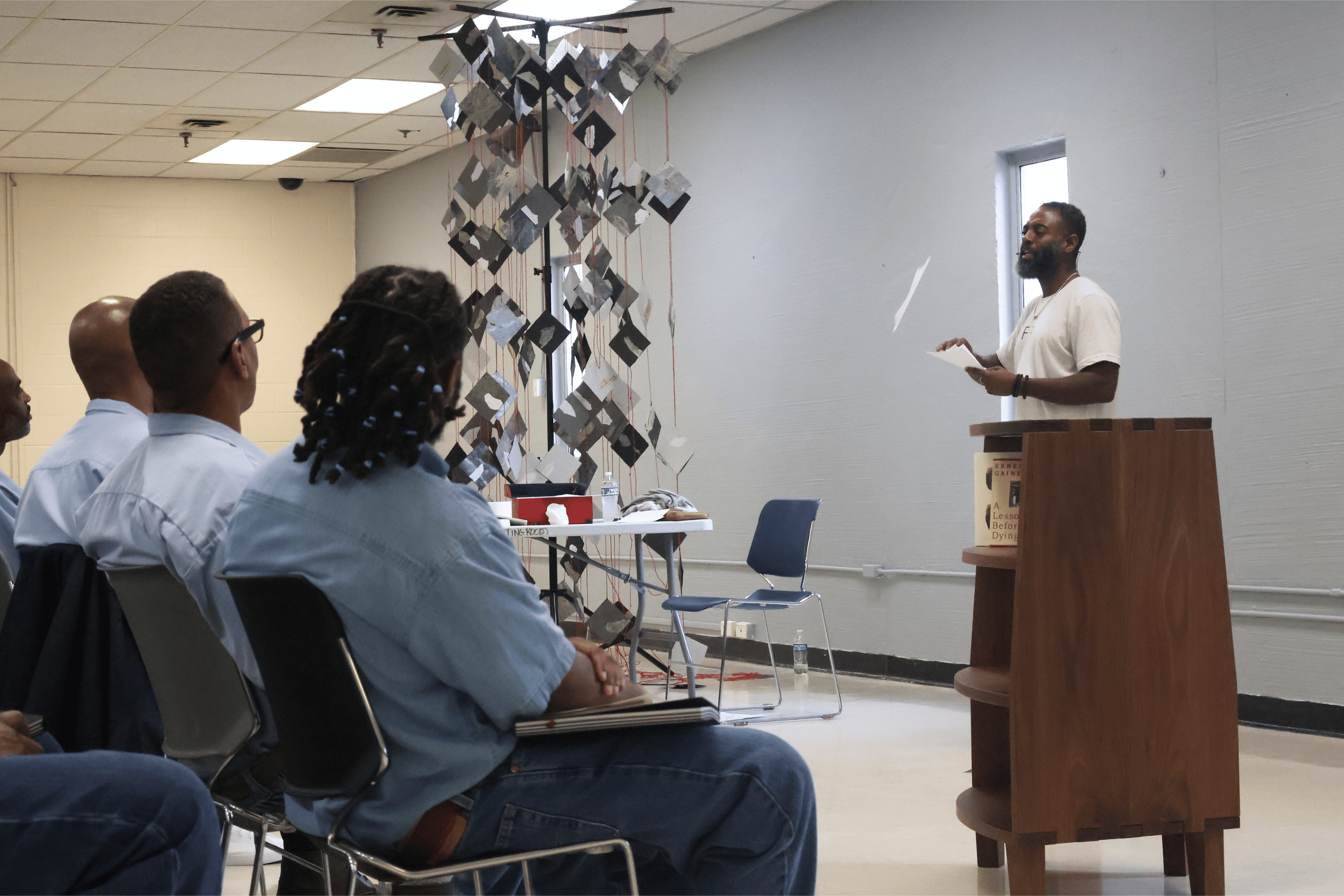 Freedom Reads Founder & CEO Reginald Dwayne Betts performs his one-man show, FELON: An American Washi Tale, at Buckingham Correctional Center on March 4, 2024.